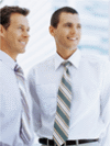 Two Men In Shirts And Ties