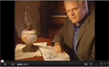 Man At Desk With Book